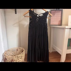 Black knee-high dress from altard state with tassels.